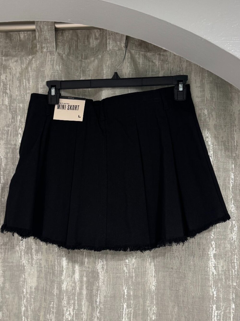 Ultra Flirt Juniors’ Pleated Raw-Edge-Hem Mini Skort. Trendy